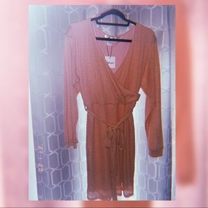 Rose coloured dress.